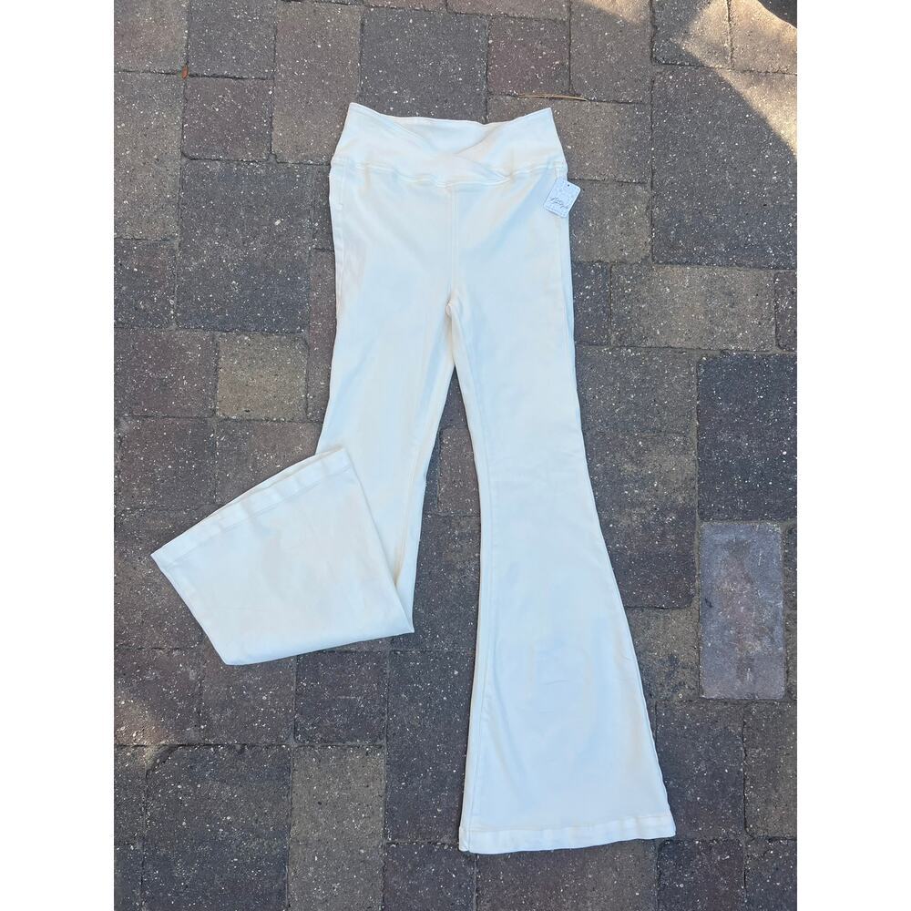 NWT We the Free cream stretchy hi rise flare jeans size 27x34